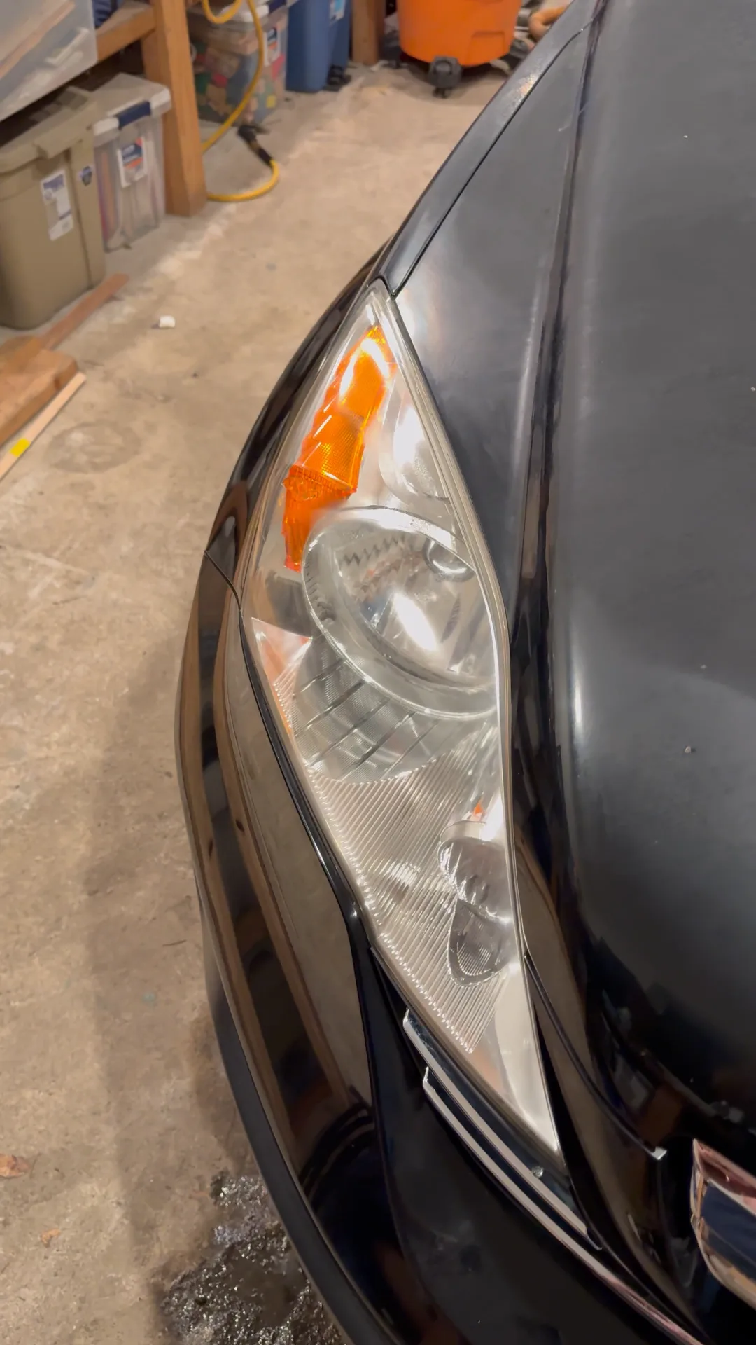 After: the same headlight restored to crystal clear